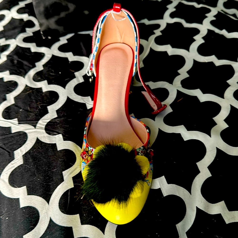 ONE-of-Kind Shoe. Bought , tried at home.  Too Big . Very Ornate. Show Stopper